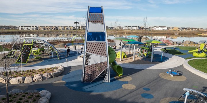 Elevated view of the playground at Central Park in Maple Grove with alpha tower and crab trap. 