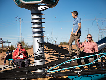 Inclusive play expert team sitting on a playground
